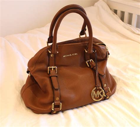 original michael kors bag olx|Michael Kors used medium bags.